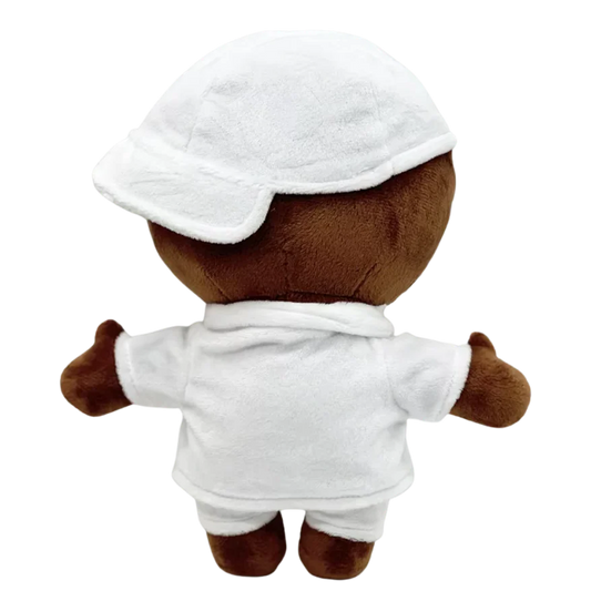 THE FIRST EVER rapper plush collectible — charcoal peacoat over black mock-neck with silver Cuban link chain