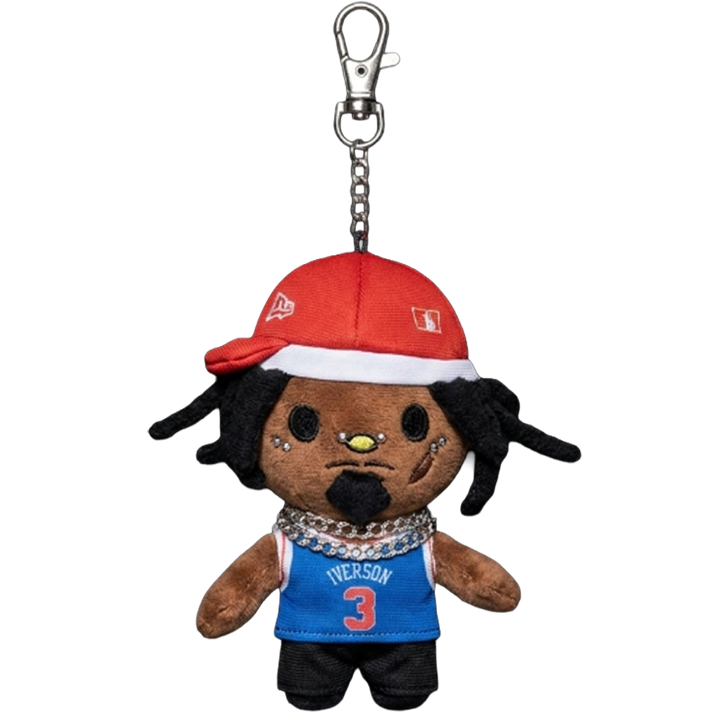 THE CARTI plush keychain bag charm — embroidered facial tattoos and high-volume hair