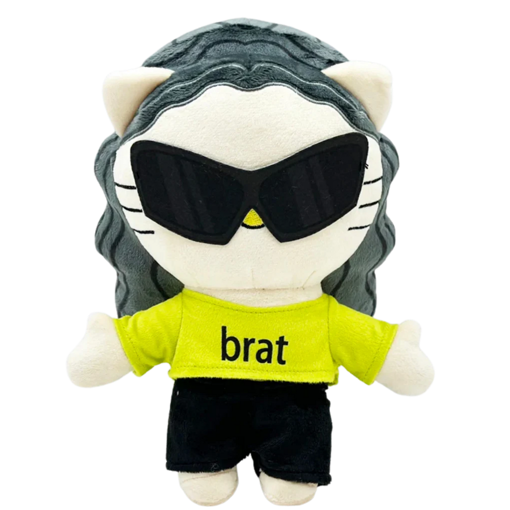 THE BRAT pop plush collectible, soft sculpture figure with high-chroma green cropped tee and charcoal wavy hair