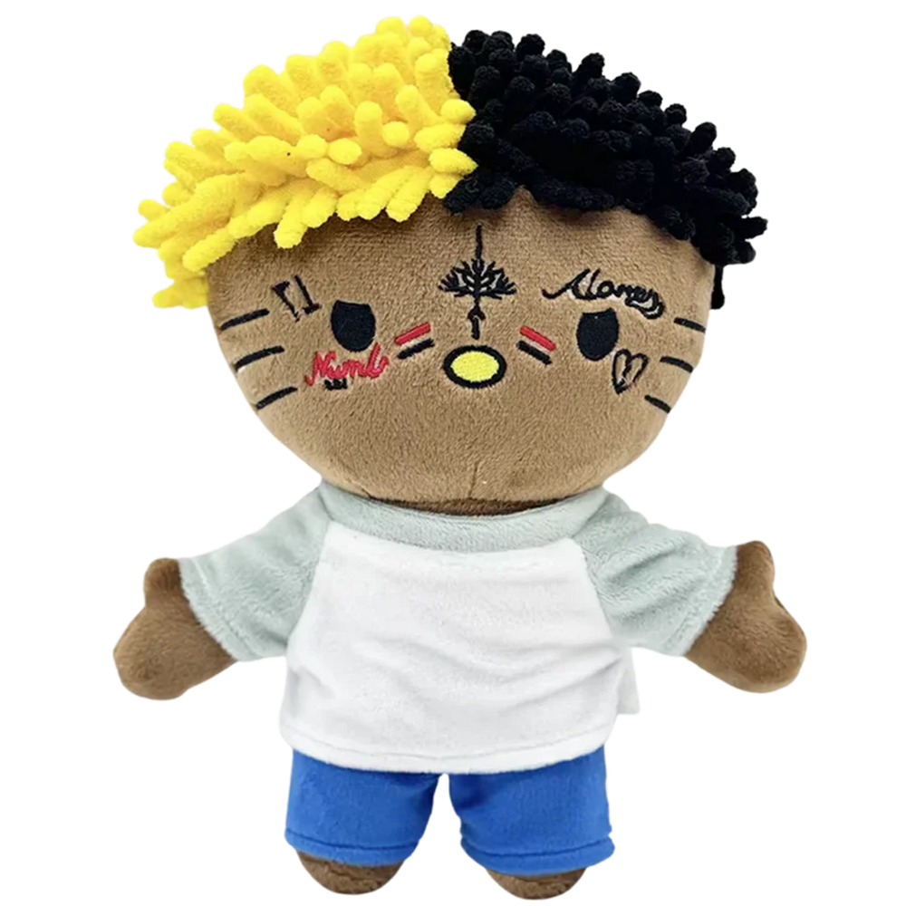 THE REVENGE rapper plush collectible, soft sculpture figure with split-tone yellow-and-black rope hair and facial ink