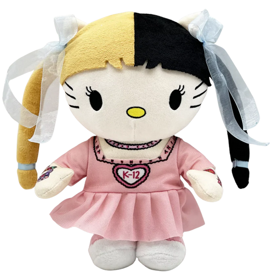 THE K-12 pop plush collectible — soft sculpture in pastel pink ruffled dress with heart K-12 branding