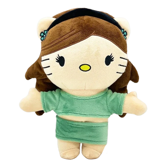 THE GRANDE pop plush collectible — soft sculpture figure in seafoam green crop top with high-volume brunette hair