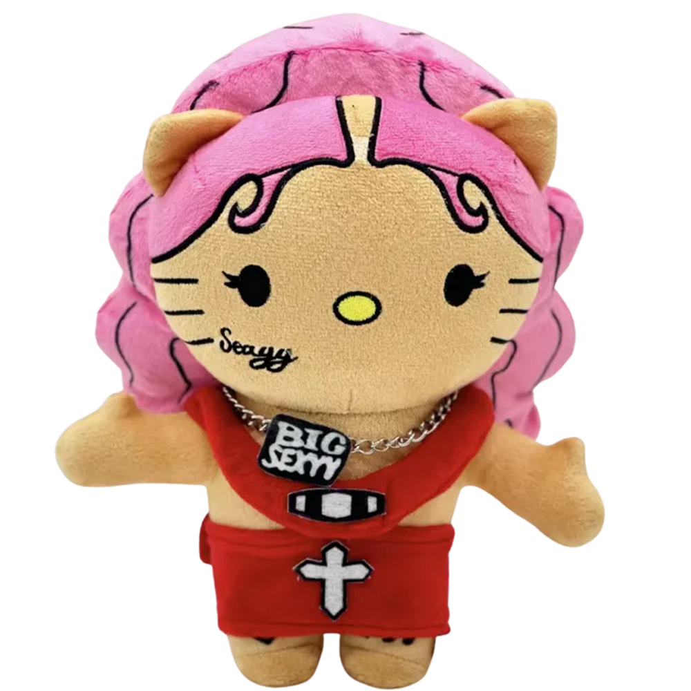 THE REDD rapper plush collectible, soft sculpture figure with hot-pink wave-contour hair and high-chroma red crop top